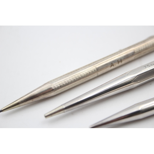 2206 - Three hallmarked sterling silver propelling pencils to include Yard-O-Led etc. - approx. gross weigh... 