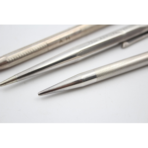 2206 - Three hallmarked sterling silver propelling pencils to include Yard-O-Led etc. - approx. gross weigh... 