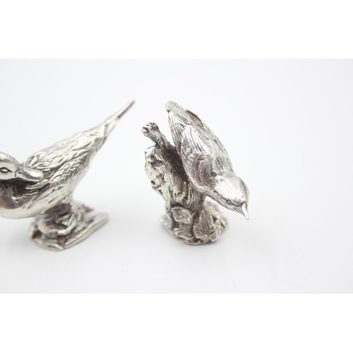 2211 - Two hallmarked sterling silver bird ornaments - approx. gross weight 77g and largest 3cm high