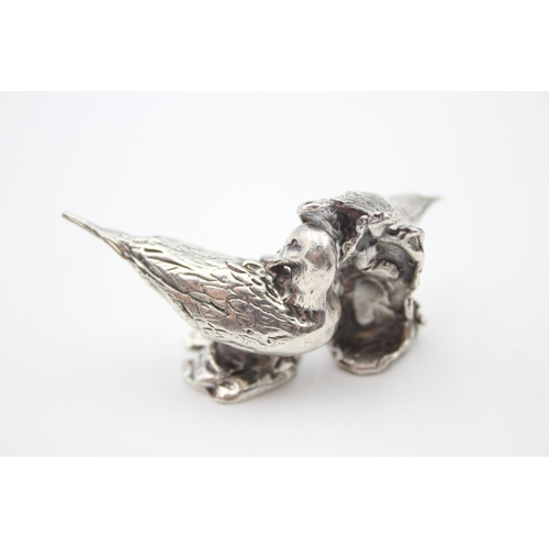 2211 - Two hallmarked sterling silver bird ornaments - approx. gross weight 77g and largest 3cm high