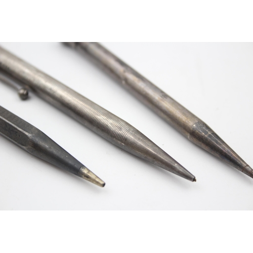 2215 - Three hallmarked sterling silver propelling pencils - approx. gross weight 56g