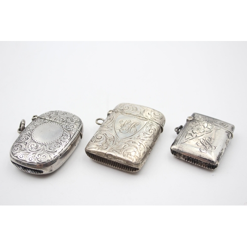 2219 - Three hallmarked sterling silver vesta cases - approx. gross weight 64g