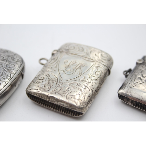 2219 - Three hallmarked sterling silver vesta cases - approx. gross weight 64g