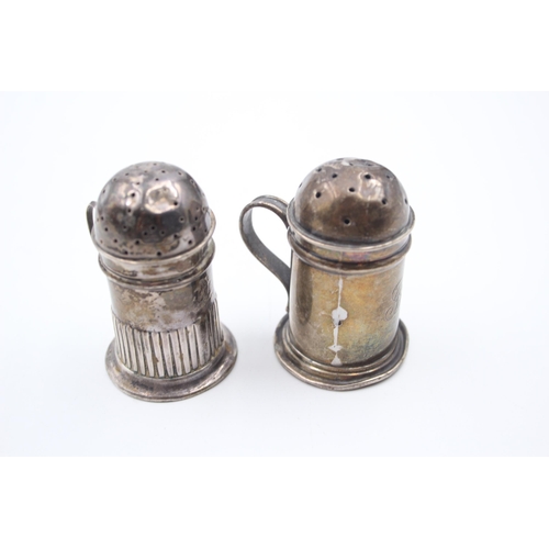 2221 - Two Victorian hallmarked sterling silver novelty pepperettes - approx. gross weight 49g