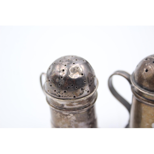 2221 - Two Victorian hallmarked sterling silver novelty pepperettes - approx. gross weight 49g