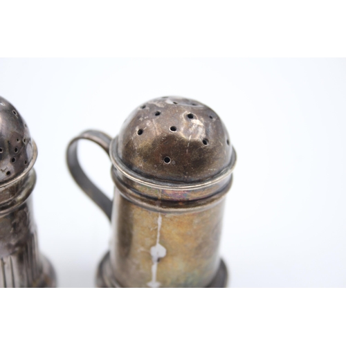 2221 - Two Victorian hallmarked sterling silver novelty pepperettes - approx. gross weight 49g