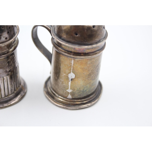 2221 - Two Victorian hallmarked sterling silver novelty pepperettes - approx. gross weight 49g