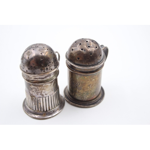 2221 - Two Victorian hallmarked sterling silver novelty pepperettes - approx. gross weight 49g