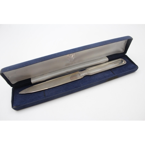 2222 - A boxed hallmarked sterling silver letter opener - approx. gross weight 59g