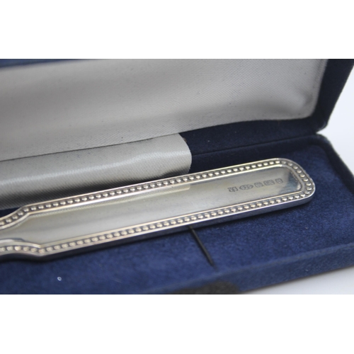 2222 - A boxed hallmarked sterling silver letter opener - approx. gross weight 59g