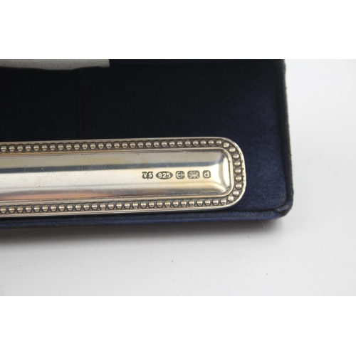 2222 - A boxed hallmarked sterling silver letter opener - approx. gross weight 59g