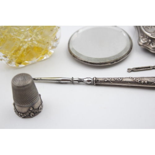 2228 - Seven hallmarked sterling silver vanity and haberdashery items - approx. gross weight 95g