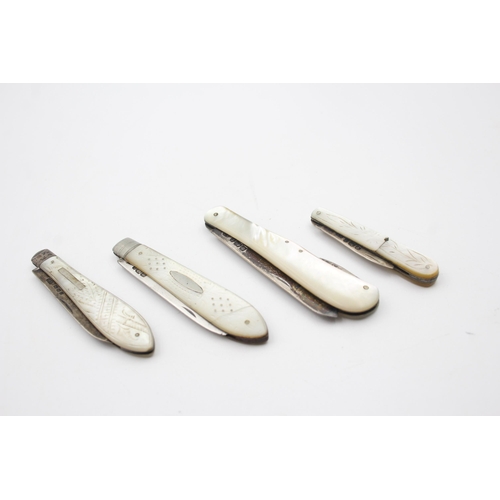 2232 - Four hallmarked sterling silver and mother of pearl fruit knives - approx. gross weight 76g