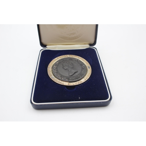 2237 - A boxed Wedgwood hallmarked sterling silver framed commemorative medallion - approx. gross weight 57... 