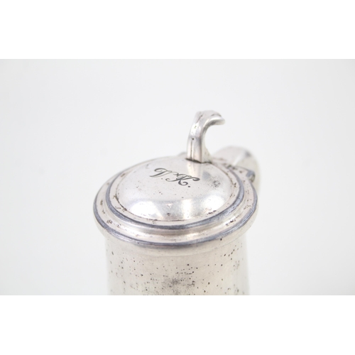 2251 - An Alfred Dunhill silver plated tankard table lighter