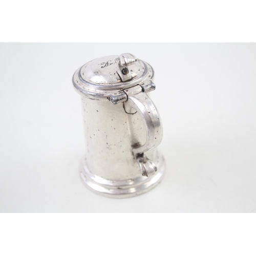 2251 - An Alfred Dunhill silver plated tankard table lighter