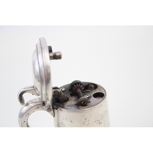 2251 - An Alfred Dunhill silver plated tankard table lighter