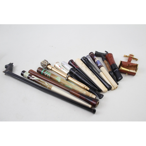 2253 - Fifteen cheroot holders to include meerschaum etc.