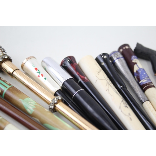 2253 - Fifteen cheroot holders to include meerschaum etc.