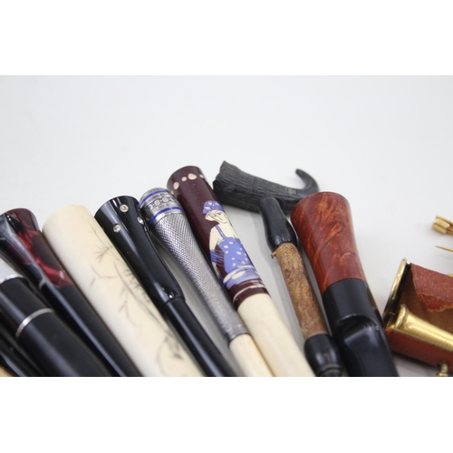 2253 - Fifteen cheroot holders to include meerschaum etc.