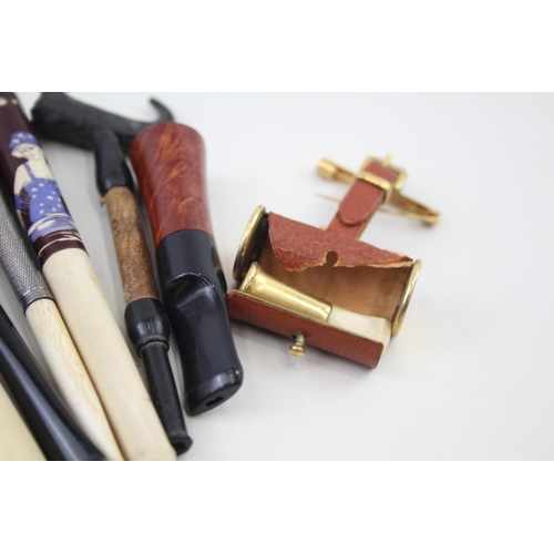 2253 - Fifteen cheroot holders to include meerschaum etc.