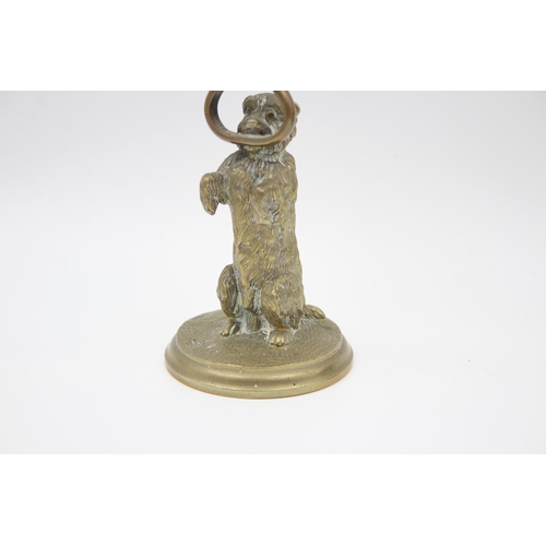 2256 - A vintage brass novelty terrier dog candlestick - approx. 16.5cm high