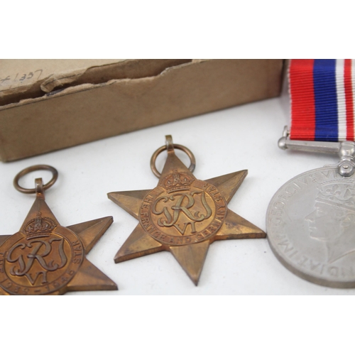 2281 - A boxed WWII medal trio comprising The 1939-1945 Star, The France and Germany Star and War