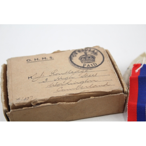 2281 - A boxed WWII medal trio comprising The 1939-1945 Star, The France and Germany Star and War