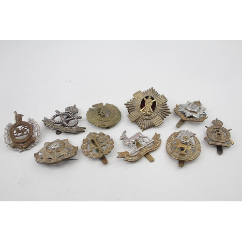 2285 - Ten military cap badges