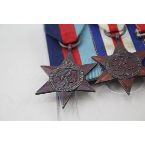 2289 - Two mounted WWII medal groups, one featuring The France and Germany Star, The 1939-1945 Star and Bri... 