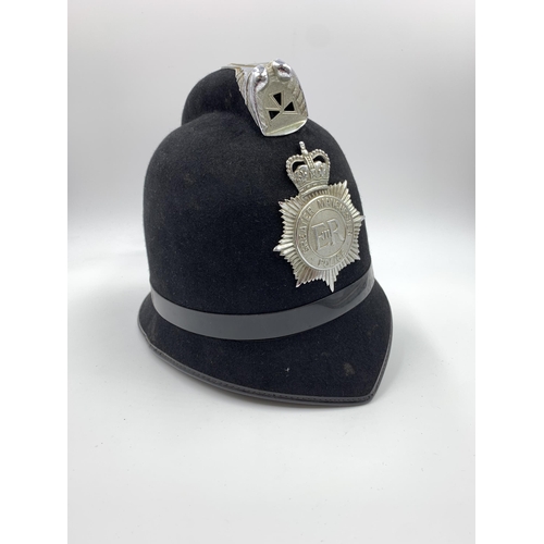 2274 - A vintage 'Christys' London' Greater Manchester Police rose top helmet