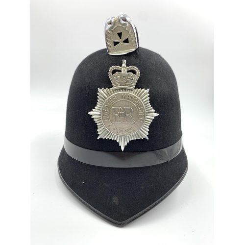 2274 - A vintage 'Christys' London' Greater Manchester Police rose top helmet