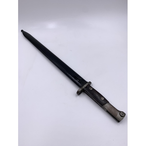 2276 - A pre WWII M1935 bayonet with scabbard, possibly Turkish - blade approx. 38cm