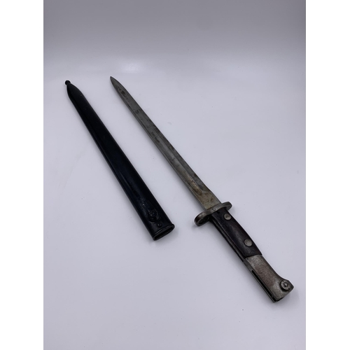 2276 - A pre WWII M1935 bayonet with scabbard, possibly Turkish - blade approx. 38cm