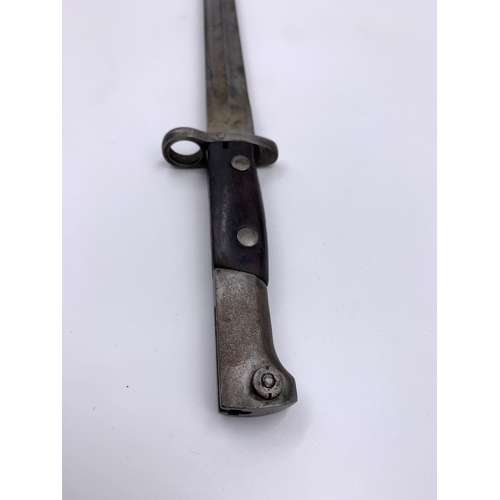 2276 - A pre WWII M1935 bayonet with scabbard, possibly Turkish - blade approx. 38cm