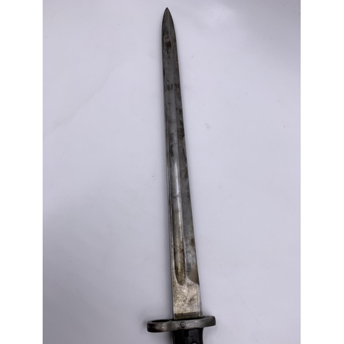 2276 - A pre WWII M1935 bayonet with scabbard, possibly Turkish - blade approx. 38cm