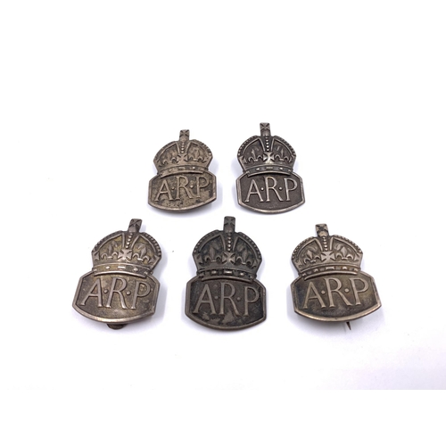 2303 - Five WWII hallmarked London silver ARP badges, four Sir John Herbert McCutcheon Craig - two dated 19... 