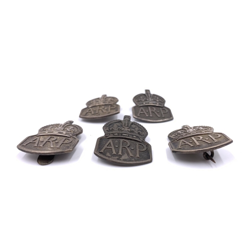 2303 - Five WWII hallmarked London silver ARP badges, four Sir John Herbert McCutcheon Craig - two dated 19... 