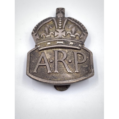 2303 - Five WWII hallmarked London silver ARP badges, four Sir John Herbert McCutcheon Craig - two dated 19... 