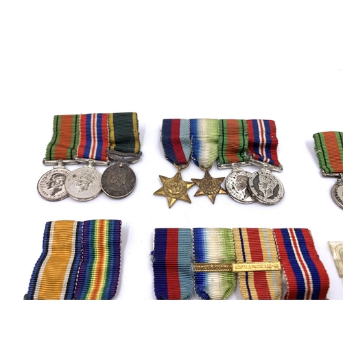 2308 - A collection of miniature British medals to include WWI War, Pacific Star, Victory etc.