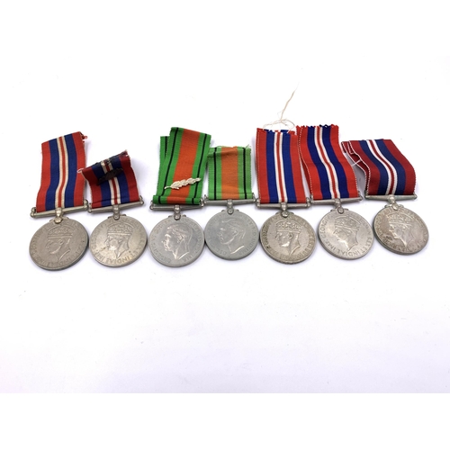 2309 - Ten WWII British medals, five War, two Defence, The Pacific Star, The 1939-1945 Star and The Italy S... 