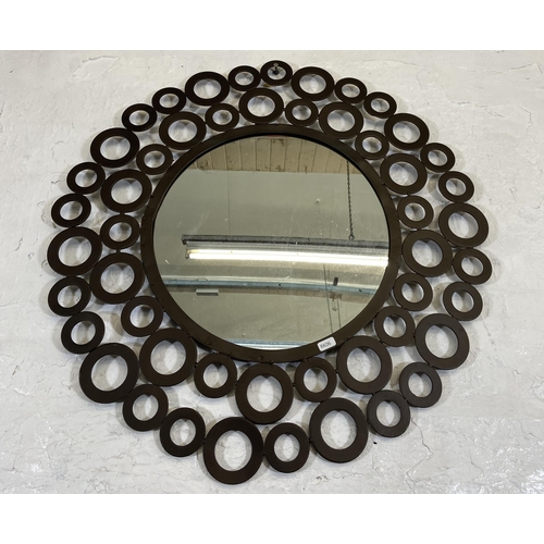 219 - A modern metal circular decorative wall mirror - approx. 68cm in diameter