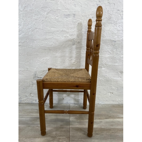 175 - Five pieces of furniture, four pine and rush seated dining chairs and one wicker basket