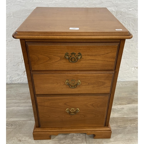 85 - A Younger cherrywood bedside chest of drawers - approx. 68cm high x 48cm wide x 46cm deep