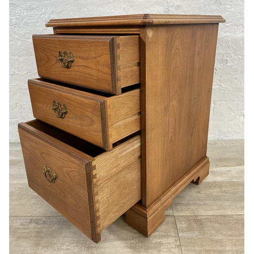 85 - A Younger cherrywood bedside chest of drawers - approx. 68cm high x 48cm wide x 46cm deep