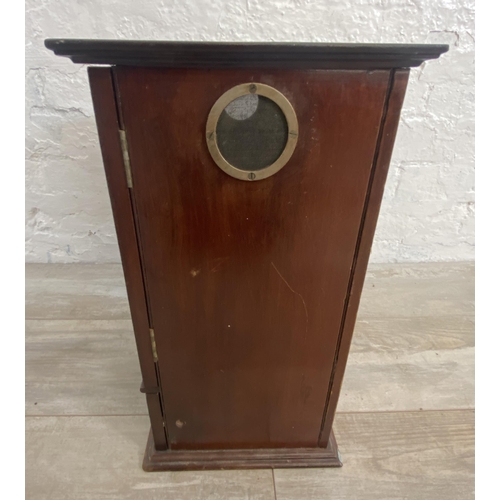 192 - An early 20th century mahogany two door smoker's cabinet - approx. 42cm high x 30cm wide x 23cm deep