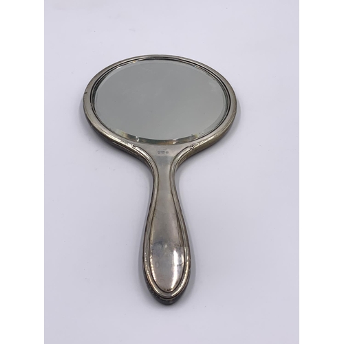 2242 - Three hallmarked Birmingham silver dressing table accessories - approx. gross weight 550g excluding ... 