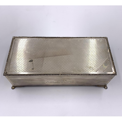 2243 - A Harman Brothers hallmarked Birmingham silver presentation cigarette box, dated 1985 - approx. gros... 