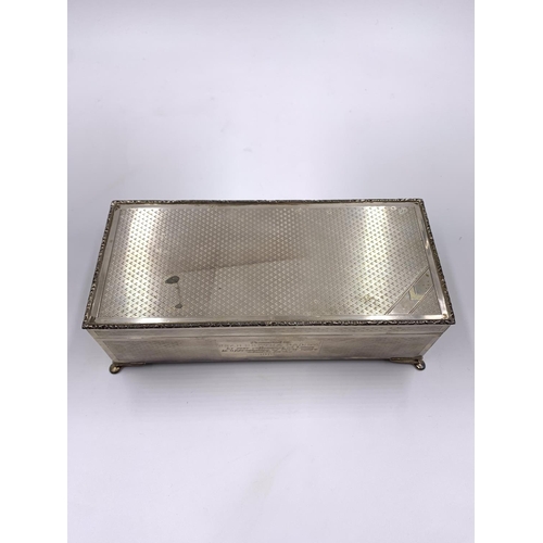 2243 - A Harman Brothers hallmarked Birmingham silver presentation cigarette box, dated 1985 - approx. gros... 