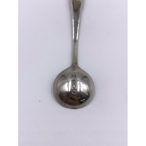 2248A - Five pieces of hallmarked sterling silver tableware, three condiment spoons, one pepper shaker and o... 